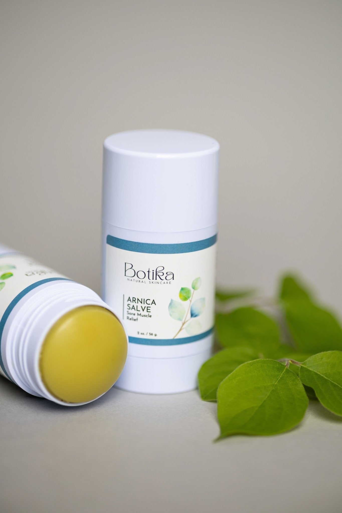 Botika Arnica Salve for Muscle & Joint Pain Relief with open lid — natural arnica and herb-infused salve for pain and inflammation